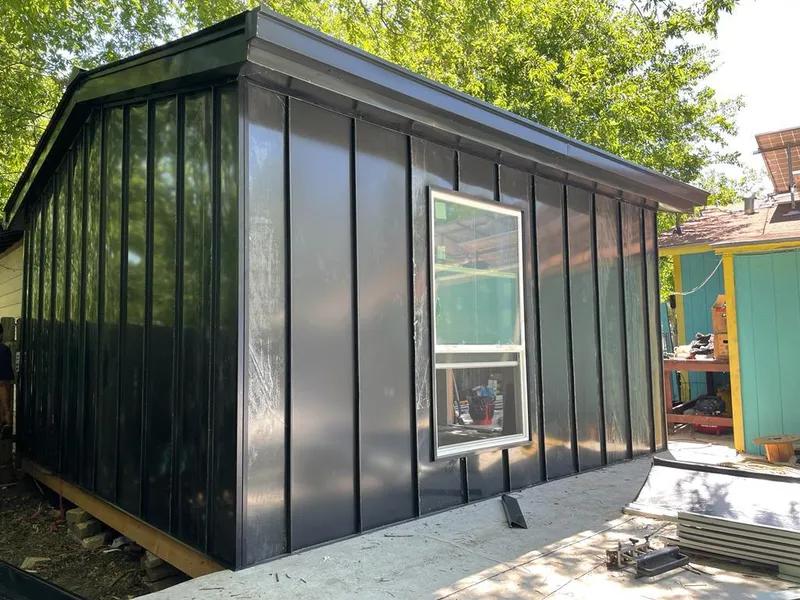 Black standing seam metal wall panels for Metal Roof Installation in Siloam Springs