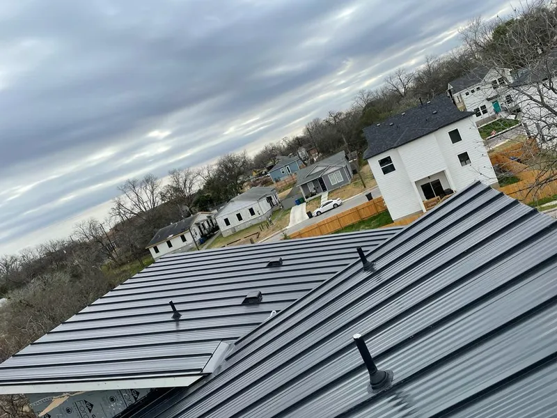 Standing seam metal roof panels with vents for Skylight Repair in Siloam Springs